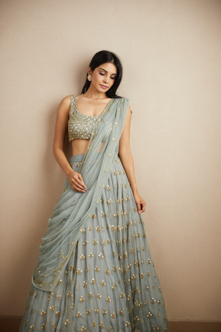 POWDER BLUE WITH GOLD BOOTIE WORK LEHENGA SET Astha Narang POWDER BLUE WITH GOLD BOOTIE WORK LEHENGA SET Astha Narang